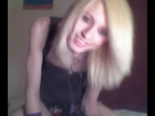 Platinum blonde emo tgirl does a bit of softcore posing