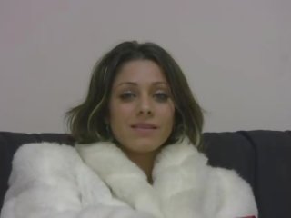 Brunette amateur in fur coat does deep throat in POV