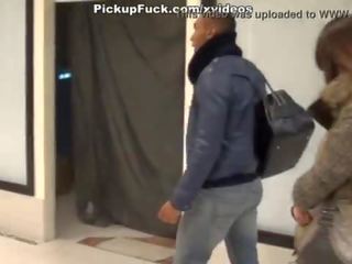 Brown cutie sucks cocks in the mall