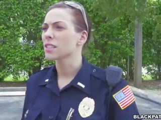 Female cops pull over black suspect and suck his cock