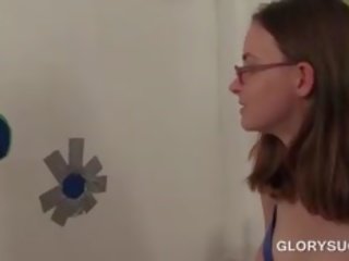 Teen In Glasses Giving Oral Job On Gloryhole